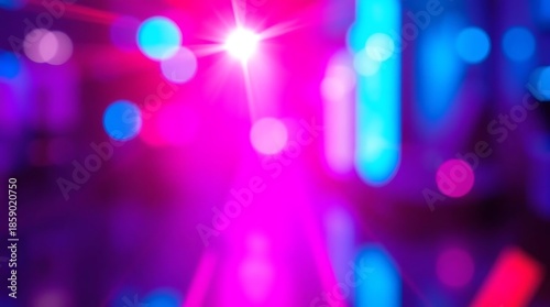 Abstract blurred lights background in vibrant pink and blue tones.