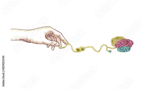 Mano sujetando un ovillo de lana multicolor, concepto de creatividad y manualidades