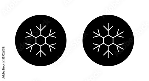 Thin snowflake icon in black circle. Winter season, ice, and cold temperature symbol