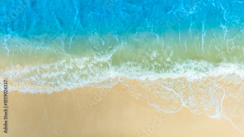 Nature of the ocean and blue sky Summer with sunshine, sandy beaches, clear blue waters sparkling against the blue sky. on an island with good ecology and environment Background for summer vacation