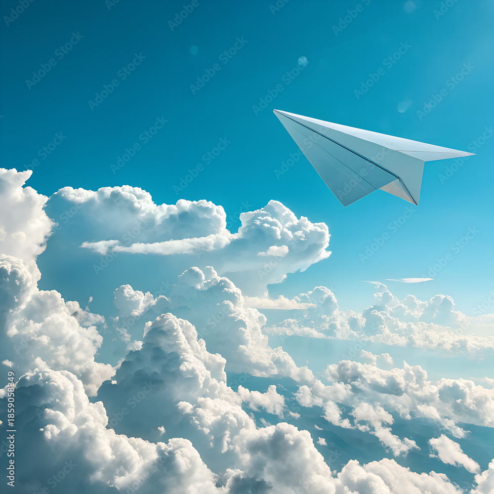 Fototapeta premium White Paper Airplane Flying Above Clouds in Bright Blue Sky.