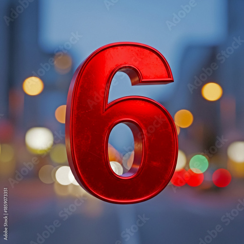 Large red number six against blurred city lights background