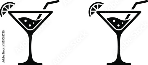 Two Black and White Cocktail Glasses with Lemon Slices and Straws