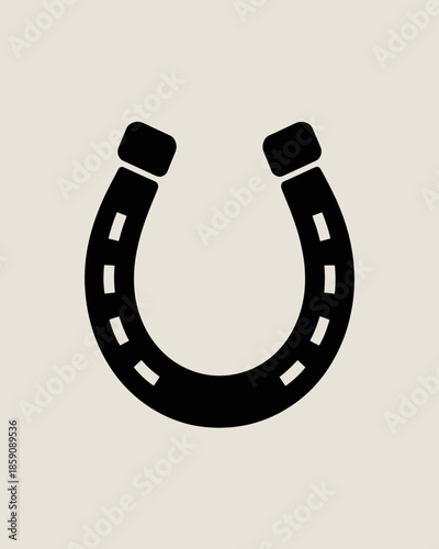 Black horseshoe icon on a beige background with white nail holes.
