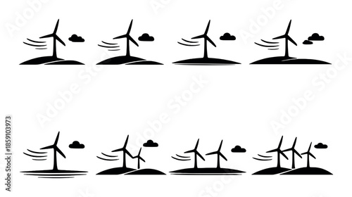 Silhouettes of wind turbines against cloudy sky