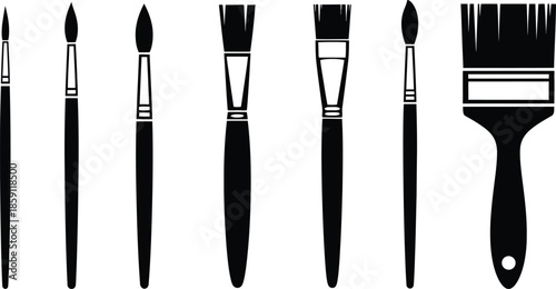 Collection of varied paint brushes in black silhouette on transparent background
