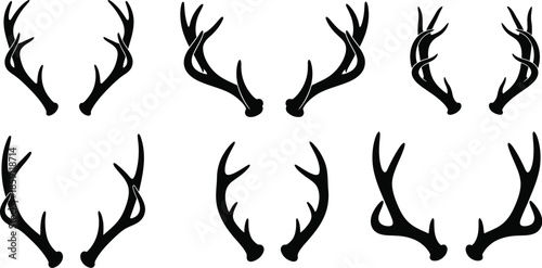 Collection of various deer antlers in black silhouette on transparent background