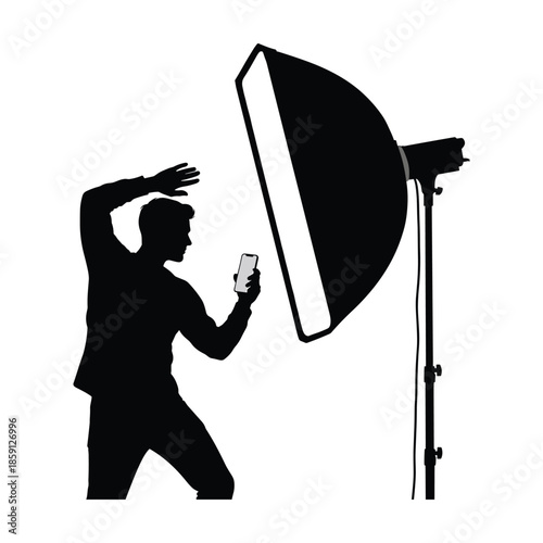 Man Taking Selfie with Studio Light Silhouette