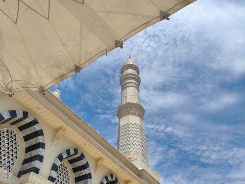 Mosque Minaret with Geometric Patterns and Canopy