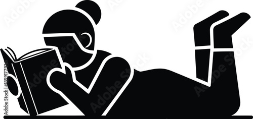 Black silhouette of a person reading a book while lying down