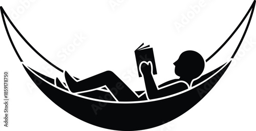 Black silhouette of person reading book in hammock 1