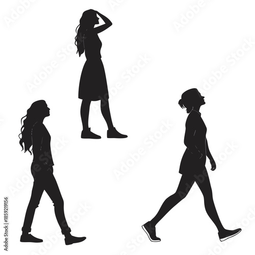 Silhouettes of women walking