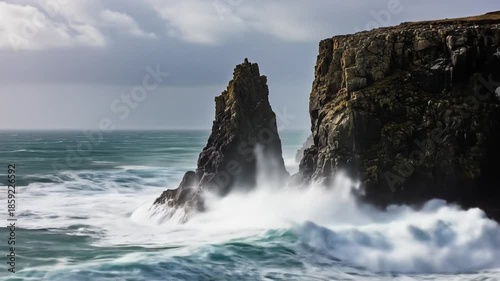 Ocean's fury: Captivating footage of towering waves crashing against rocky sea cliffs, creating a