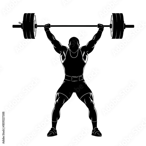 Silhouette of a weightlifter completing an overhead barbell lift
