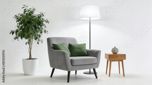 Modern living room corner with gray armchair, green cushions, floor lamp, wooden side table, and potted plant