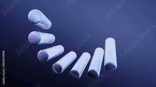 Reflective metallic cylinders rotating in elegant minimalist design. Endless loop.