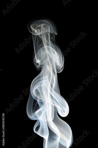 Swirling white smoke stands out against a solid black background