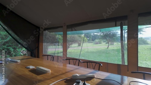 Interior of charging station tent at Porini Lion Camp in Masai Mara, Kenya