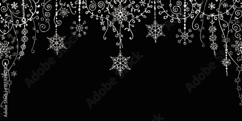 Delicate white snowflakes and ornaments on a black background create winter magic