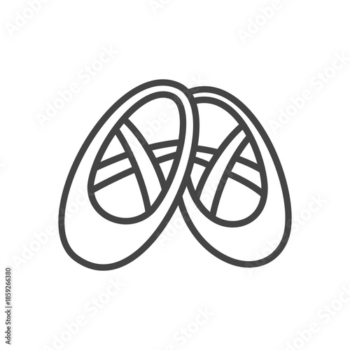 Cute ballet shoes icon. Monochrome doodle illustration of ballet slippers with ribbons. Kawaii girly sticker. Vector 10 EPS.