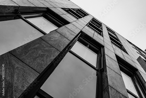 Εκτύπωση καμβά Modern stone facade and glass windows in minimalist black and white architecture