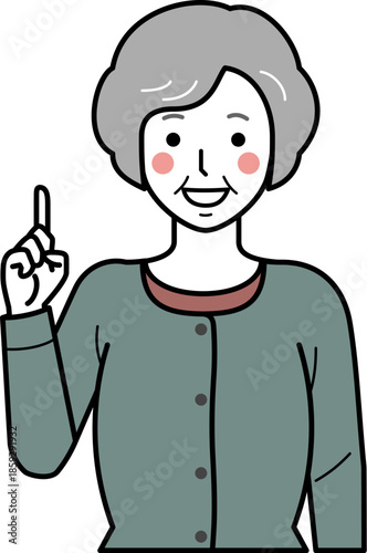 正面向き。ナンバーワンポーズをするカーディガンを着た高齢女性。