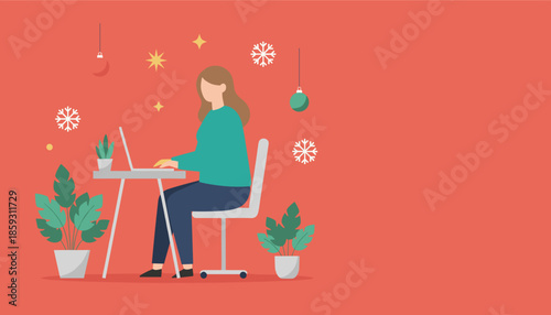 Woman working on laptop in a festive home office decorated with winter holiday elements