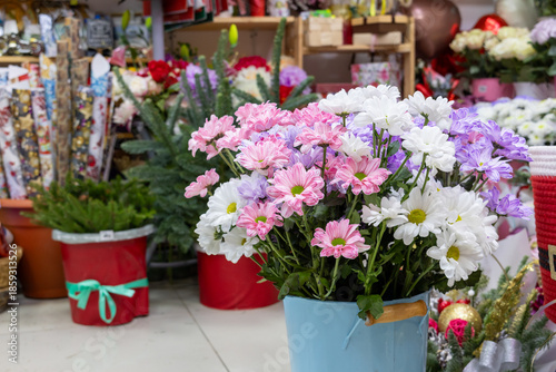 Wallpaper Mural Mixed bouquet of pink, white and purple chrysanthemums in blue metal bucket inside flower shop. Torontodigital.ca