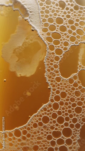 Abstract Yellow Liquid Foam Movement