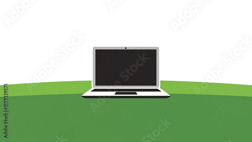A computer sits centered on a green surface with white background, its black screen contrasting with the bright display