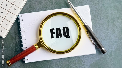 Animation the appearance of a conceptual phrase, a FAQ symbol on a blank sheet through a magnifying glass. Development concept, business, strategy, innovation, technology