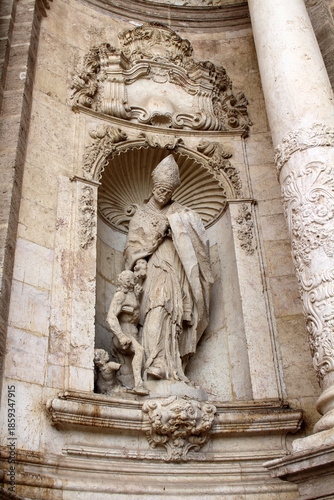 Statues of saints at Valencia Cathedral, highlighting historic religious sculpture and Gothic stone architecture, taken in July 2024.
