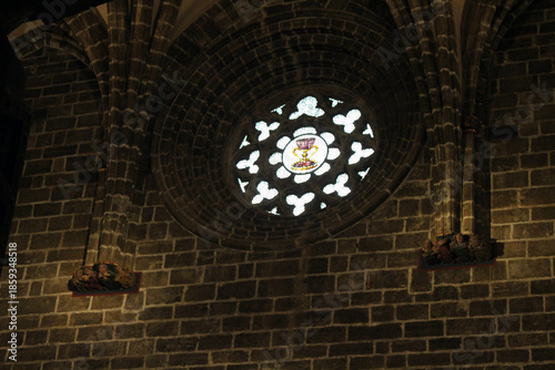 Stained glass window depicting the Holy Grail inside a chapel of Valencia Cathedral, taken in July 2024.