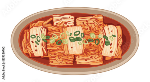 Traditional Korean kimchi dish served on an oval plate garnished with sliced green onions and seasoned with spicy red chili pepper flakes.