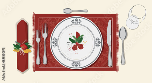Elegant formal Christmas table setting with a decorated plate, cutlery, glassware, and a napkin on a red placemat.