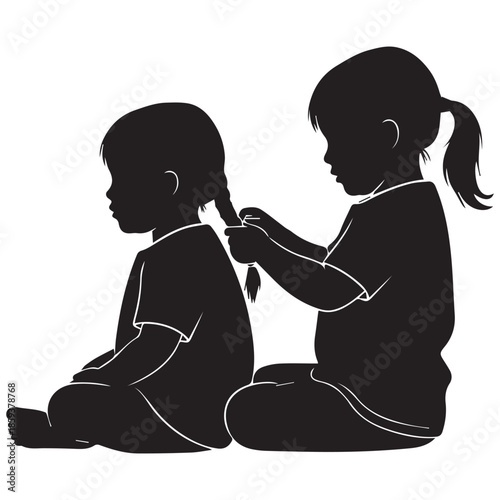 Little girl braiding her sibling's hair in a tender moment