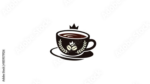 A dark coffee cup, adorned with a crown and leaf elements, sits on a saucer