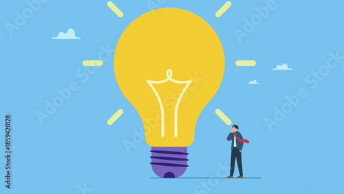 Smart businessman thinking with big oversized idea lightbulb. Think big, aspiration to win and success in business, big idea from creativity and imagination to overcome fear.