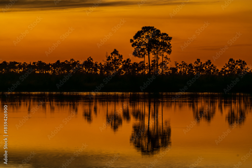 Fototapeta premium sunset over the lake