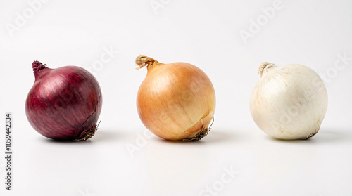 Wallpaper Mural Various onions, showcasing red, yellow, and white varieties side-by-side on a clean background Torontodigital.ca