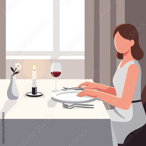 Woman sitting at a dinner table.
