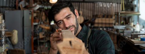 Konstfotografi Focused carpenter measuring wooden plank in workshop, professional woodworking c