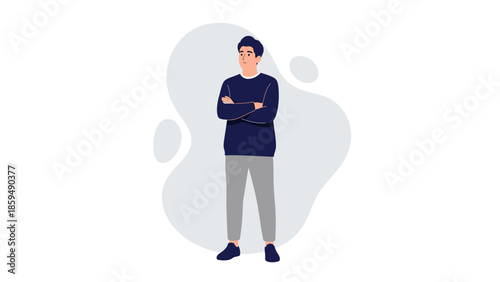 Contemplative young man standing confidently with arms crossed in casual attire against abstract