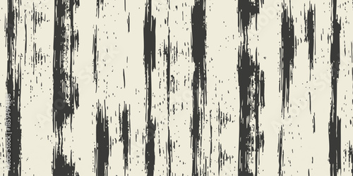 A close-up view of a textured surface with vertical black streaks on a white background