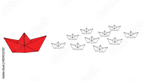 Red paper boat leading black and white origami fleet on white background