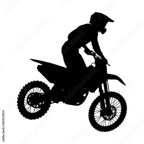 Dynamic silhouette of a motocross rider on an off-road bike adventure