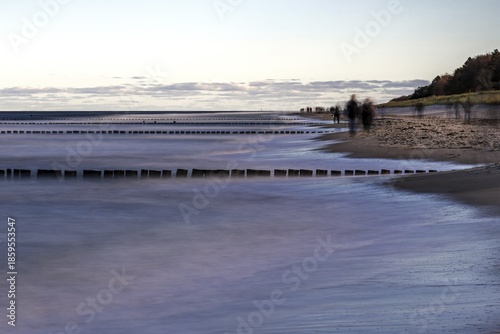 Wallpaper Mural Grooing in the sea, people on the beach, evening light, long exposure, Zingst, Fischland-Darß-Zingst, Western Pomerania National Park, Mecklenburg-Western Pomerania, Germany Torontodigital.ca