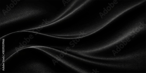 Black satin and silk fabric background with smooth flowing texture