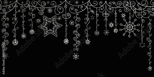 Delicate white christmas ornaments and decorative swirls on a black background