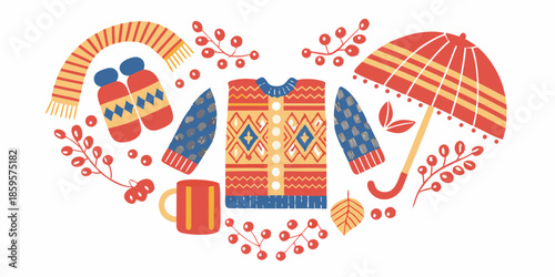 A colorful arrangement of winter clothing and accessories in a heart shape